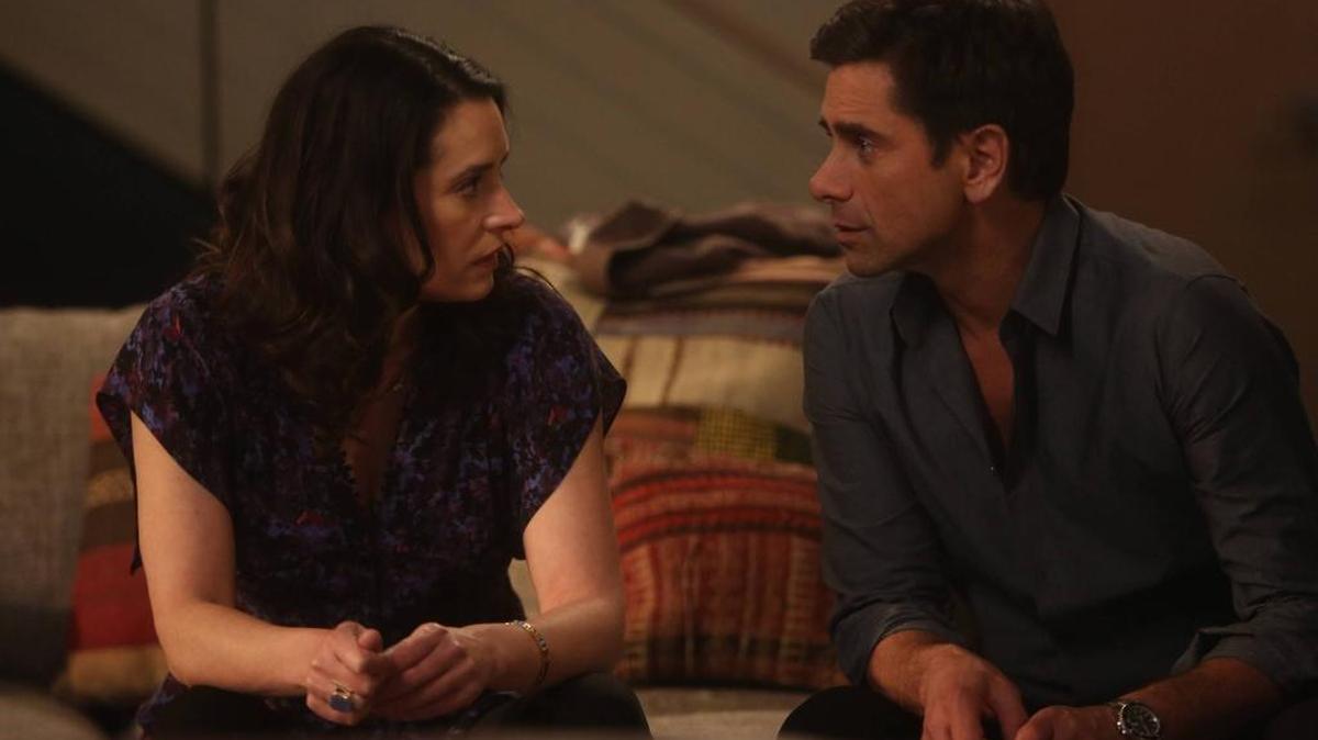 Paget Brewster, left, and John Stamos in the “Grandfathered” season finale.