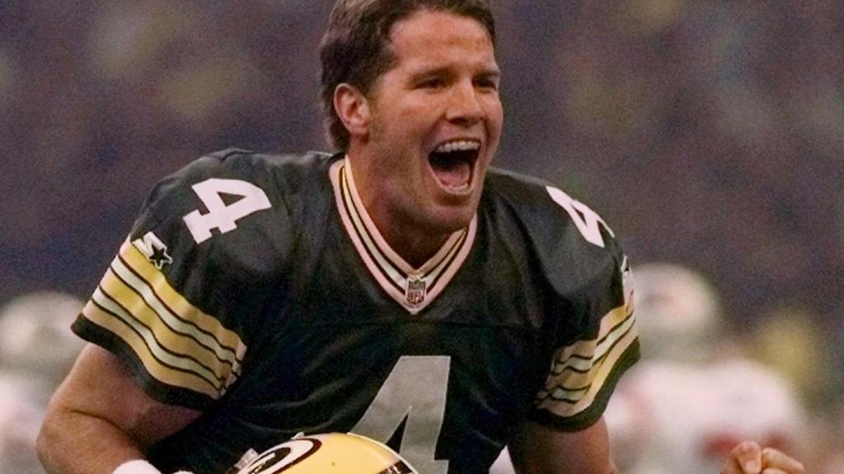 Green Bay Packers quarterback Brett Favre celebrates after throwing a touchdown pass to Andre Rison during the 1997 Super Bowl in New Orleans.