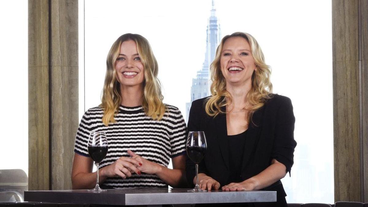 Host Margot Robbie, left, with “Saturday Night Live” cast member Kate McKinnon.