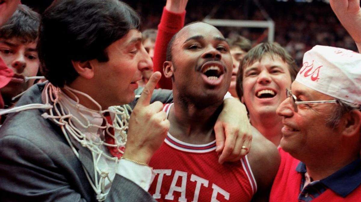 NCSU's Jim Valvano and Sidney Lowe celebrate after State beat Hopuston to win the 1983 NCAA Championship in Albequerque in March 1983.