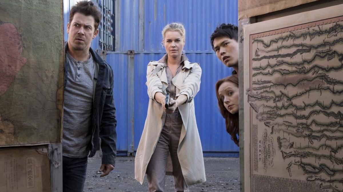 (L-R): Christian Kane, Rebecca Romijn and John Kim in “The Librarians.”