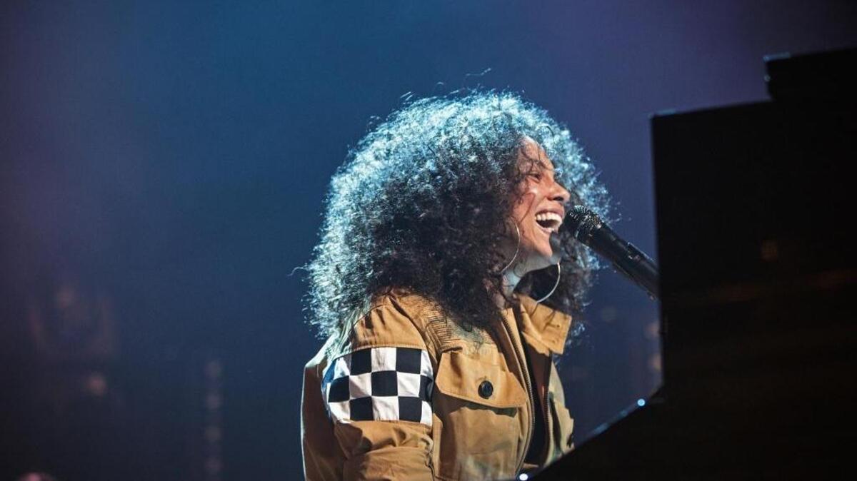 Alicia Keys performs in various locations around New York.