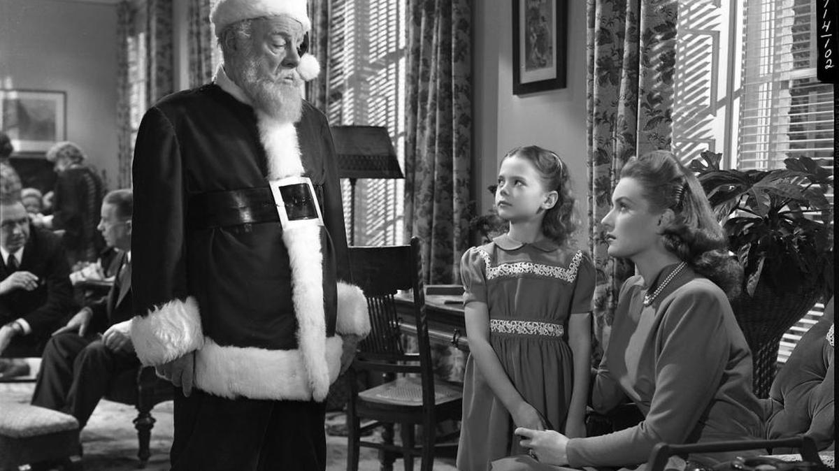 (L-R): Edmund Gwenn, Natalie Wood and Maureen O’Hara in a scene from “Miracle On 34th Street.”