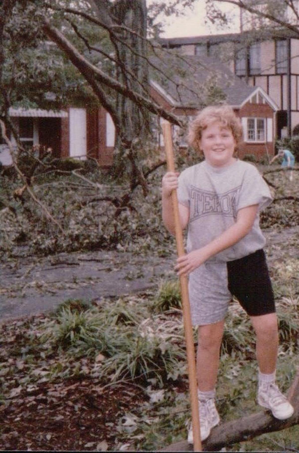 Emily Fortune Feimster at age 9, cleaning up her neighborhood after Hurricane Hugo in September 1989.