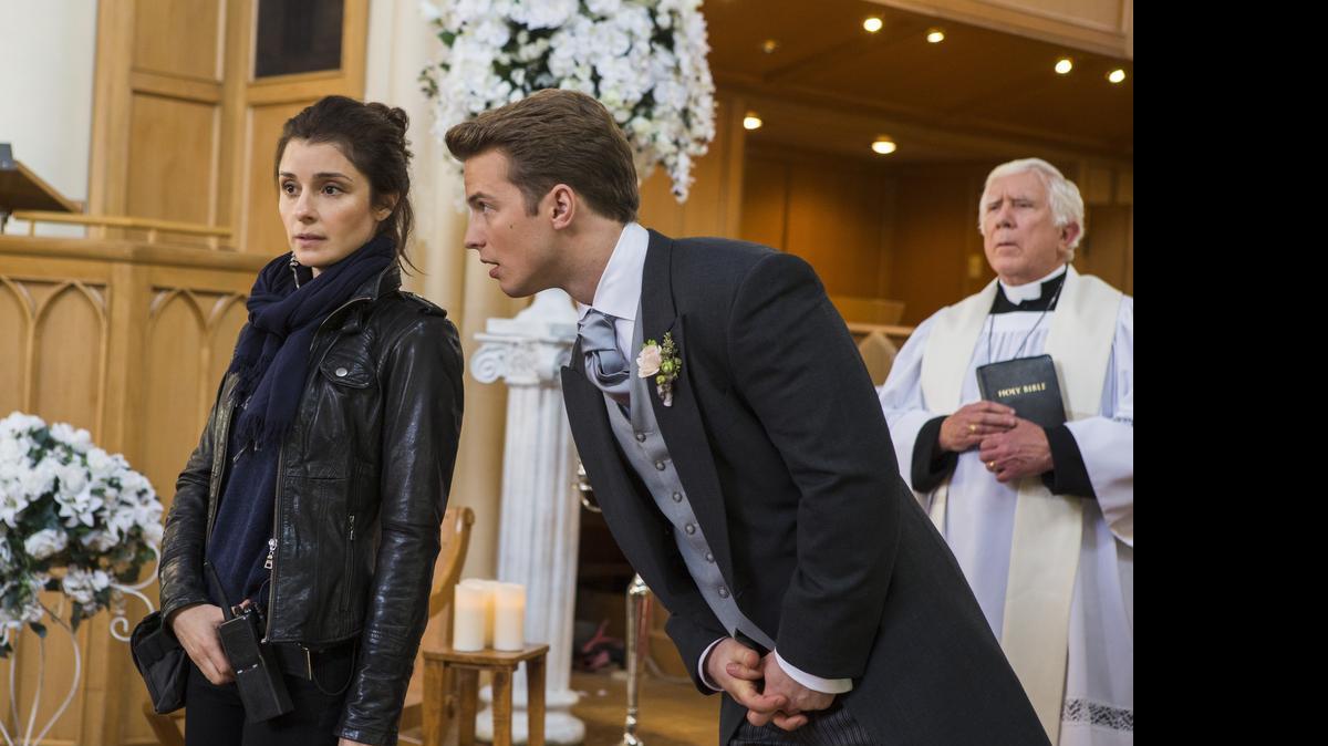 
Shiri Appleby (left) as Rachel and Freddie Stroma as Adam in Lifetime’s “UnREAL.” 

