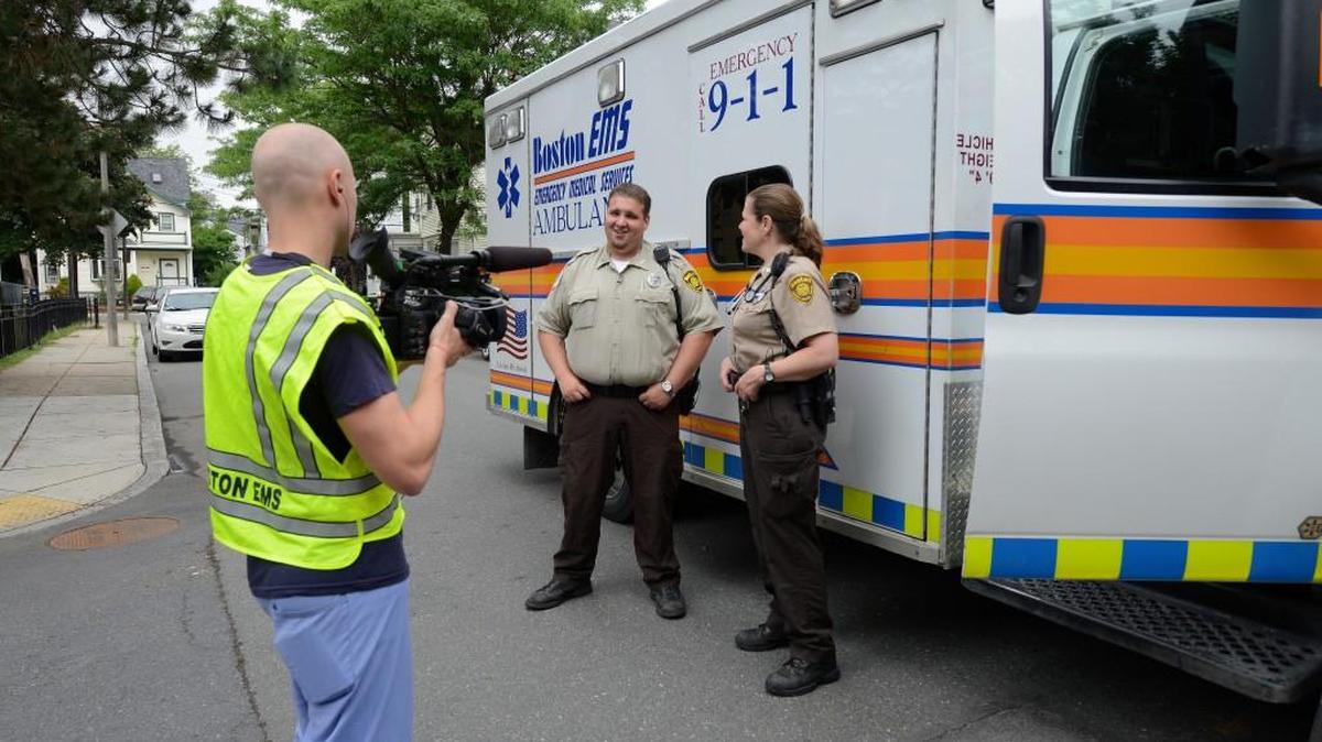 Camera crews follow Boston EMS units as they bring patients and loved ones into the hospitals.
