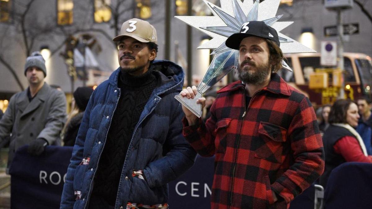 Casey Affleck, right, hosts “Saturday Night Live” with musical guest Chance the Rapper, left.