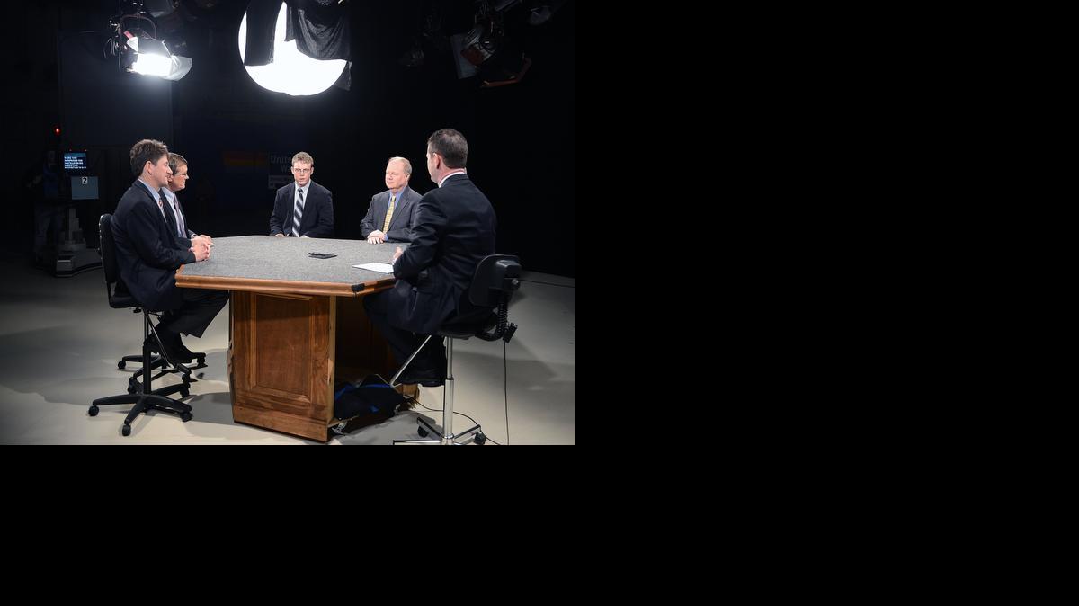 
“Off the Record,” a weekly civic affairs show hosted by Jeff Rivenbark, right, is one of the local productions done at WTVI’s (Channel 42) studios, which will be used as a laboratory for a new media degree available through Central Piedmont Community College. 
