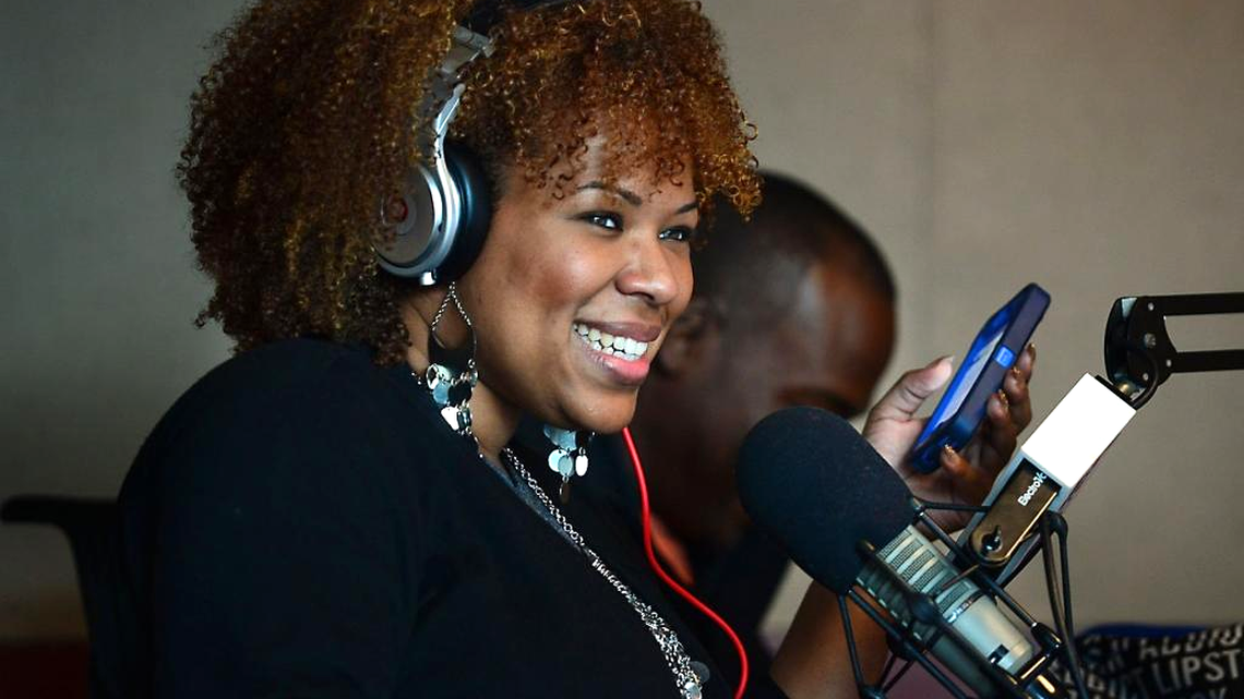 
Jessica Williams takes to the microphone during her first full-time shift Monday at Power 98 on the Morning Maddhouse.
