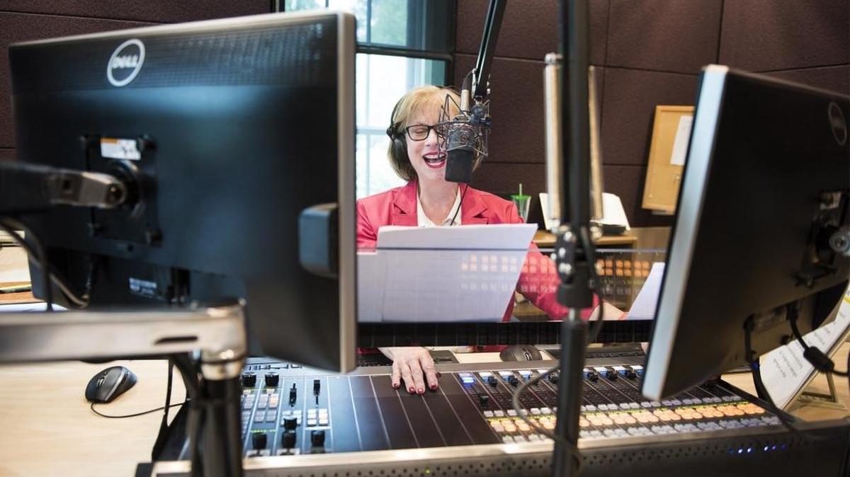 Myelita Melton goes on air in the WDAV broadcasting studio.