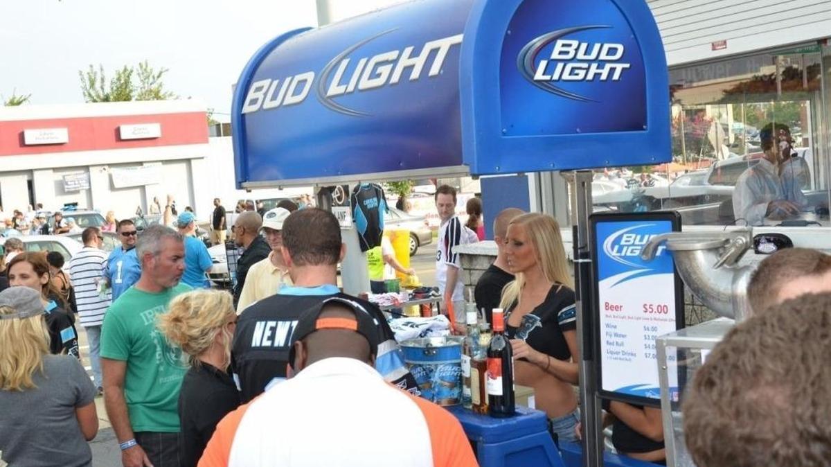 Patrons at WFNZ’s Dog House on Morehead Street during the Panthers’ Super Bowl run. WFNZ’s remote studio beside Bank of America Stadium is where some shows originate that will now be simulcast on the station’s FM signal.