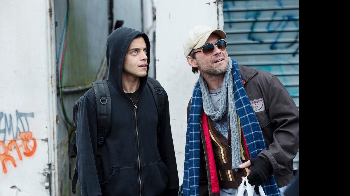 
Rami Malek (left) as Elliot and Christian Slater as Mr. Robot in the new USA series “Mr. Robot.” 
