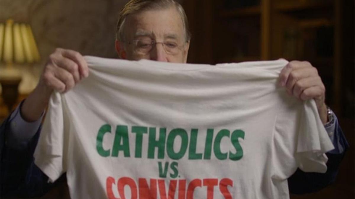 Brent Musberger, who called Miami-Notre Dame in 1988, holds up the infamous t-shirt in the “30 for 30” documentary “Catholics vs. Convicts.”