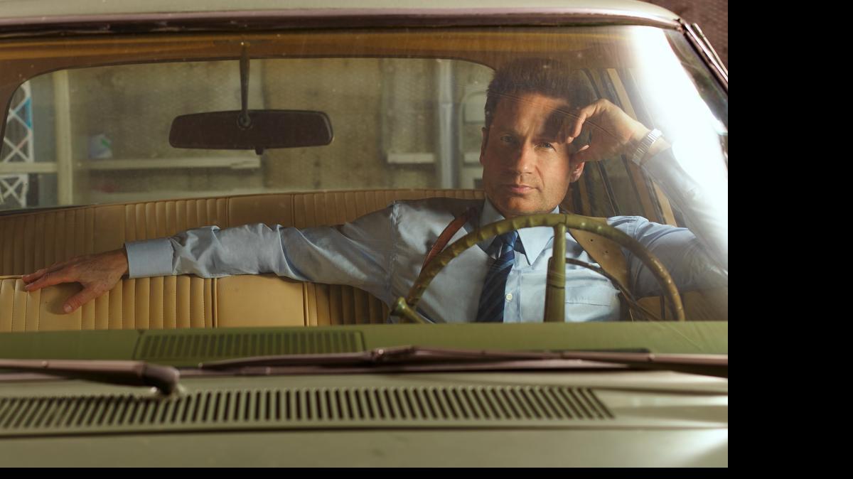 
 David Duchovny plays an LAPD detective searching for a runaway girl tangled up with the Manson family in NBC’s “Aquarius.”
