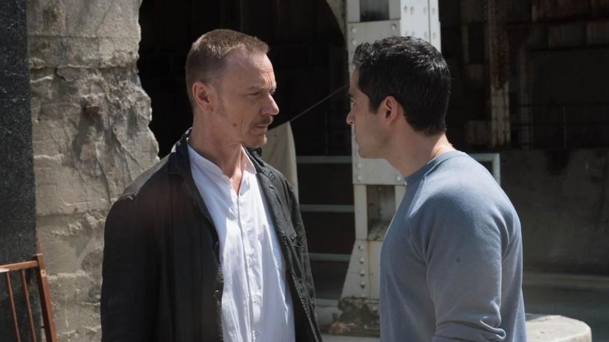 Ben Daniels, left, as Father Marcus Keane and Alfonso Herrera as Father Tomas Ortega in “The Exorcist.”