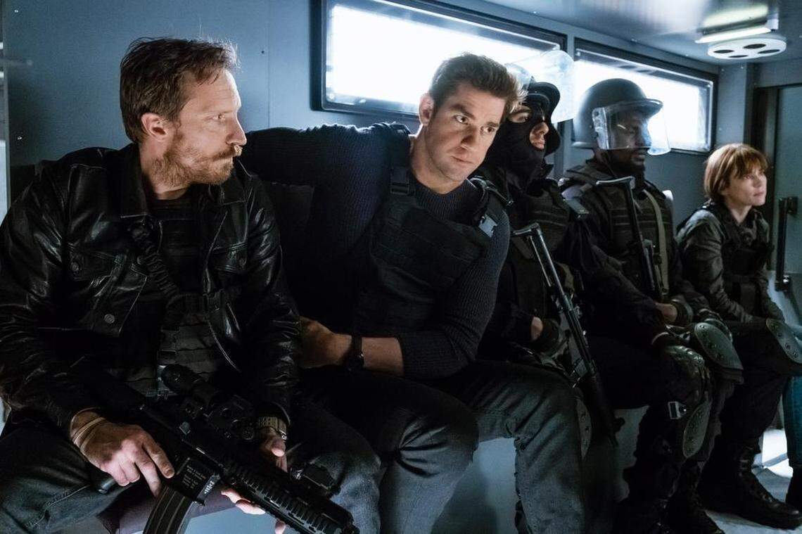 John Hoogenakker, left, with John Krasinski in a production still for Amazon’s “Tom Clancy’s Jack Ryan,” which was recently renewed for a second season. Hoogenakker plays an operator with the CIA’s Special Activities Division.