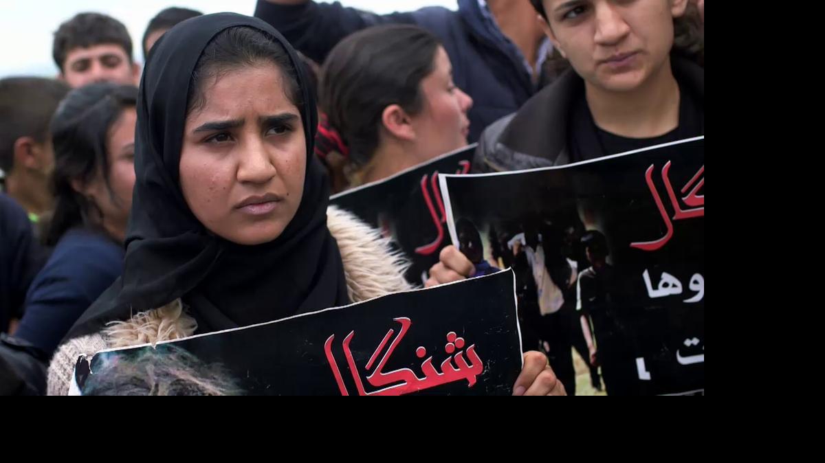 
Frontline delivers a stunning look at ISIS’ brutal treatment of women who are Yazidi — an ethnic minority hated by the Islamist group. Here, a group of Yazidi women demands international help to rescue their relatives abducted by ISIS at a protest in a camp for displaced people in Dohuk, North Iraq.

