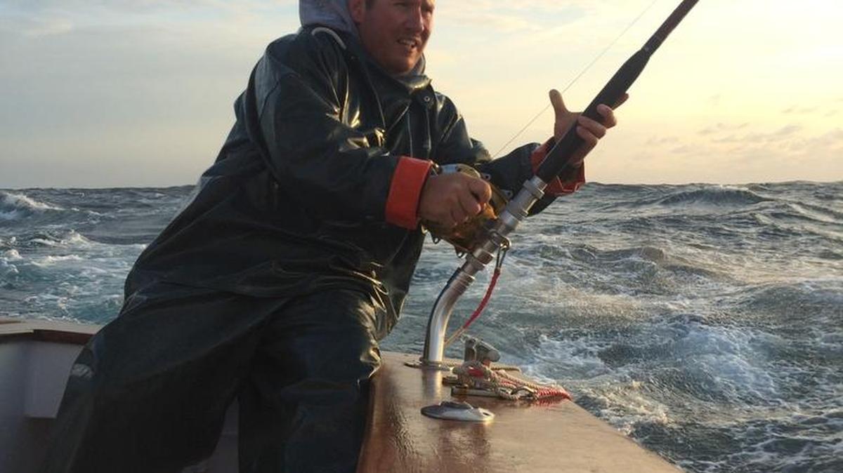First Mate Nick Gowitzka aboard the Fishin' Frenzy off the North Carolina Outer Banks.