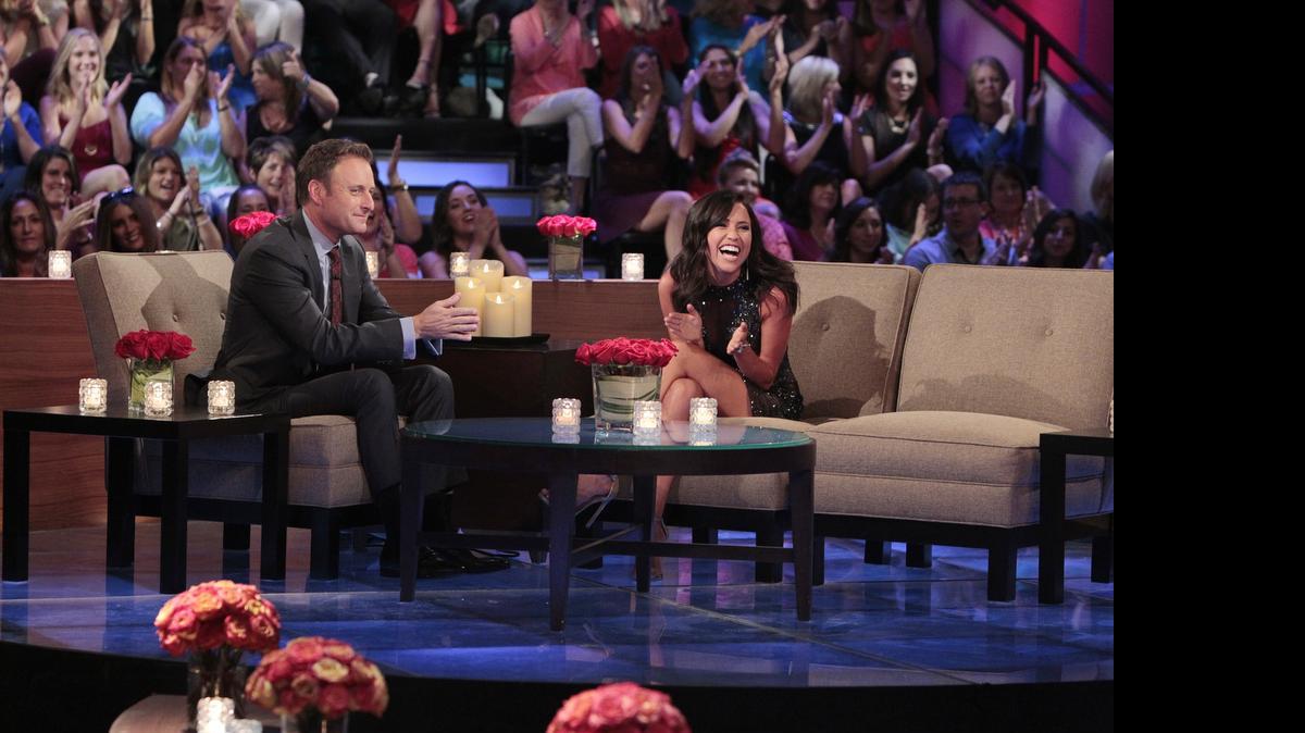 
Chris Harrison (left) listens as Kaitlyn Bristowe talks about events from the current season of “The Bachelorette.” 


