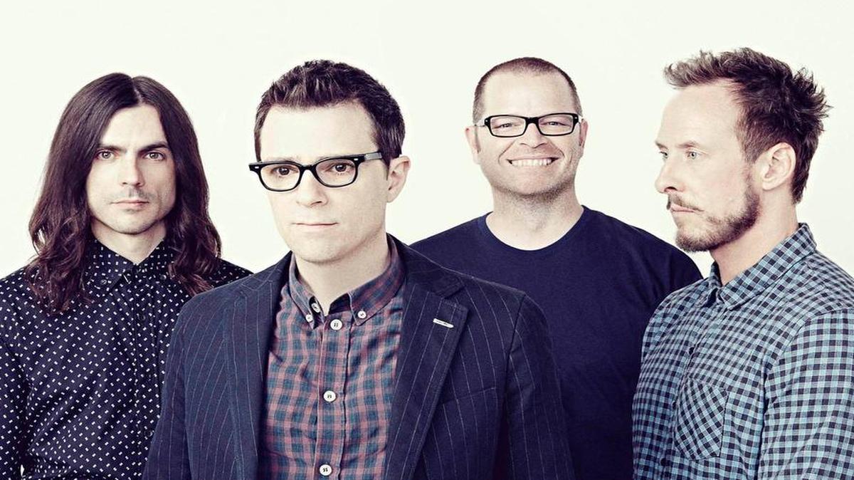 The ‘90s rock band Weezer teams up with the pop band Panic! at the Disco.