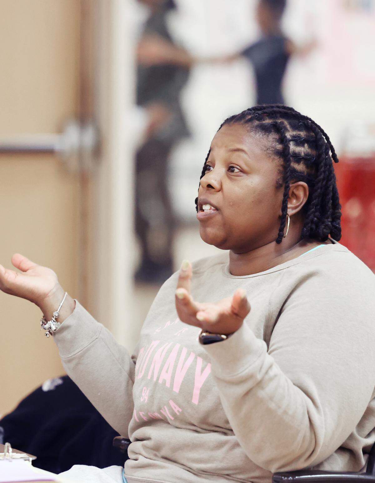 Lakeetha Blakeney, who wrote the play “Bessie Coleman: Fearless and Free," directs her play during rehearsal Monday, Oct. 27 at ImaginOn in Charlotte.