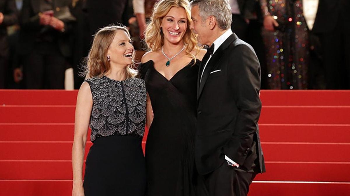 Director Jodie Foster, actors Julia Roberts and George Clooney are seen departing after the "Money Monster" premiere during the 69th annual Cannes Film Festival at the Palais des Festivals on May 12, 2016 in Cannes, France.