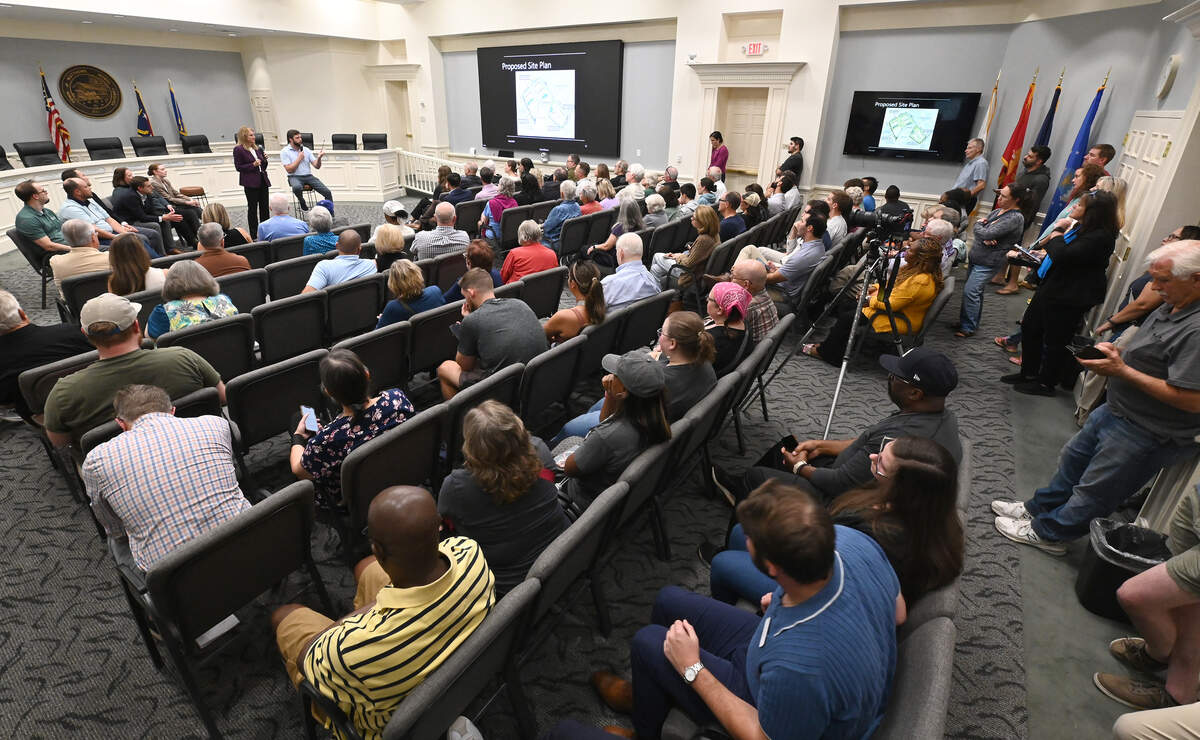 Engineered Land Solutions CEO Drew Nations addresses a citizen’s question during a community meeting at the Matthews Town Hall on Thursday.