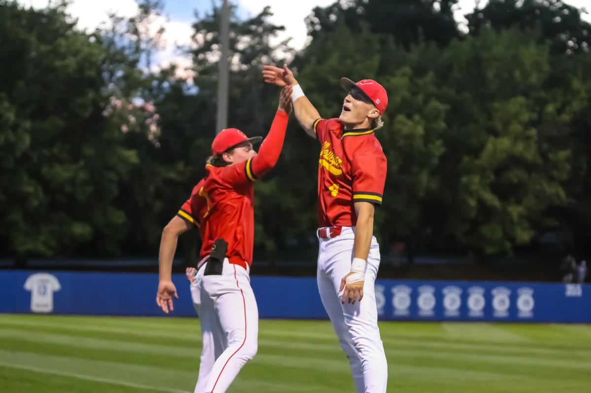 Wesleyan Christian players Nick papciak (left) and Josh Hammond (right) leap in celebration after clinching a thrilling win at Charlotte Christian in NCISAA state semifinals on May 14th, 2025 in Charlotte, NC