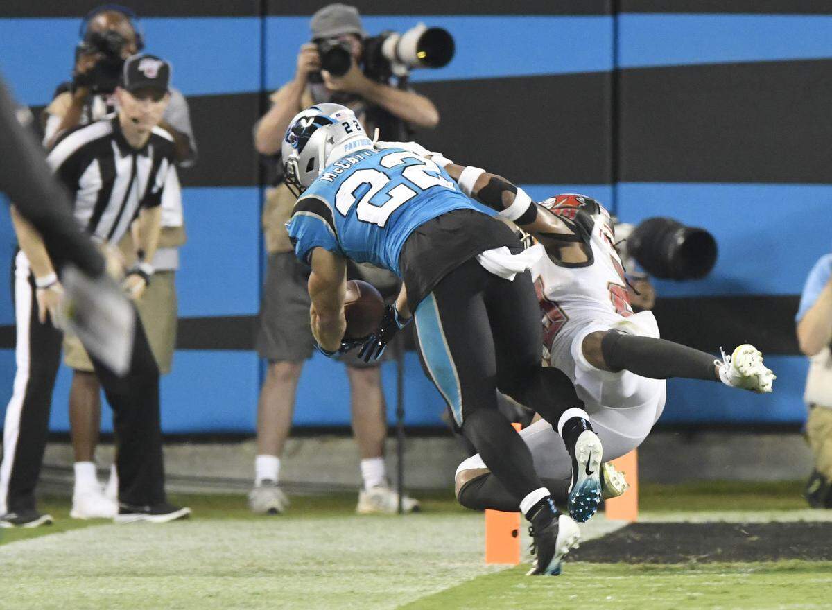 Panthers running back Christian McCaffrey (22) said after not scoring on this fourth-down play: “Coach put the ball in my hands at the end of the game and I blew it. So it’s my fault.”