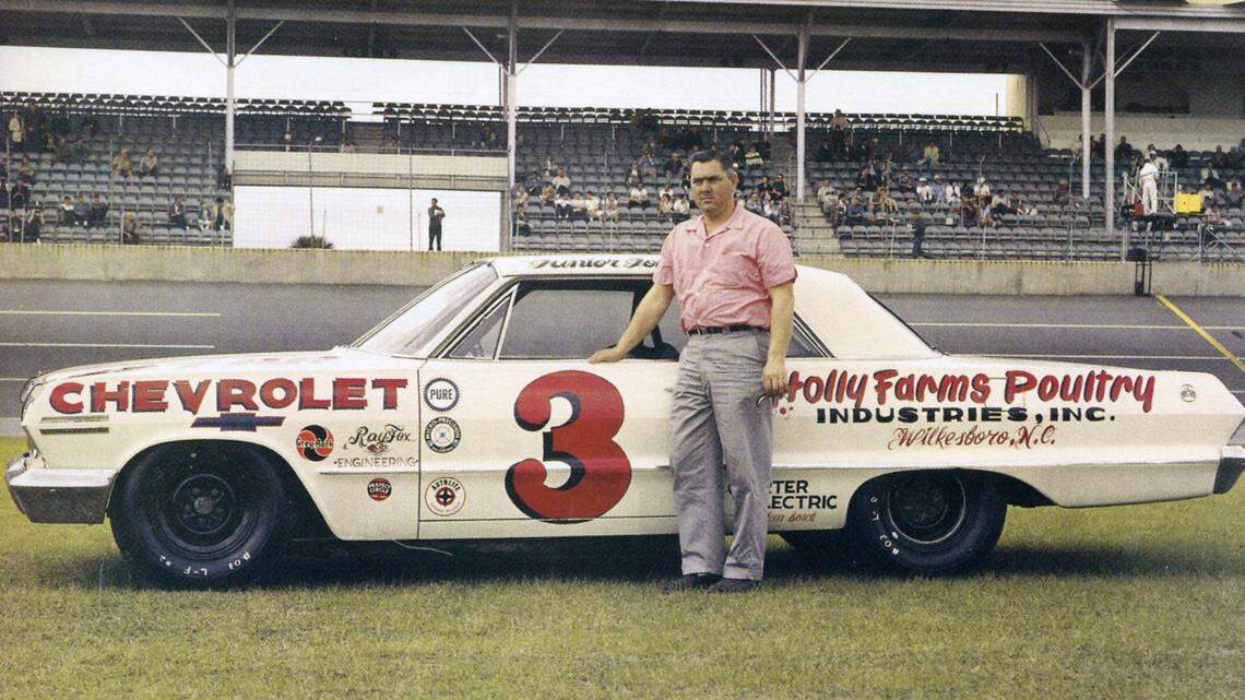 A 1963 photo of Junior Johnson with his 1962 Chevrolet Impala at Daytona.