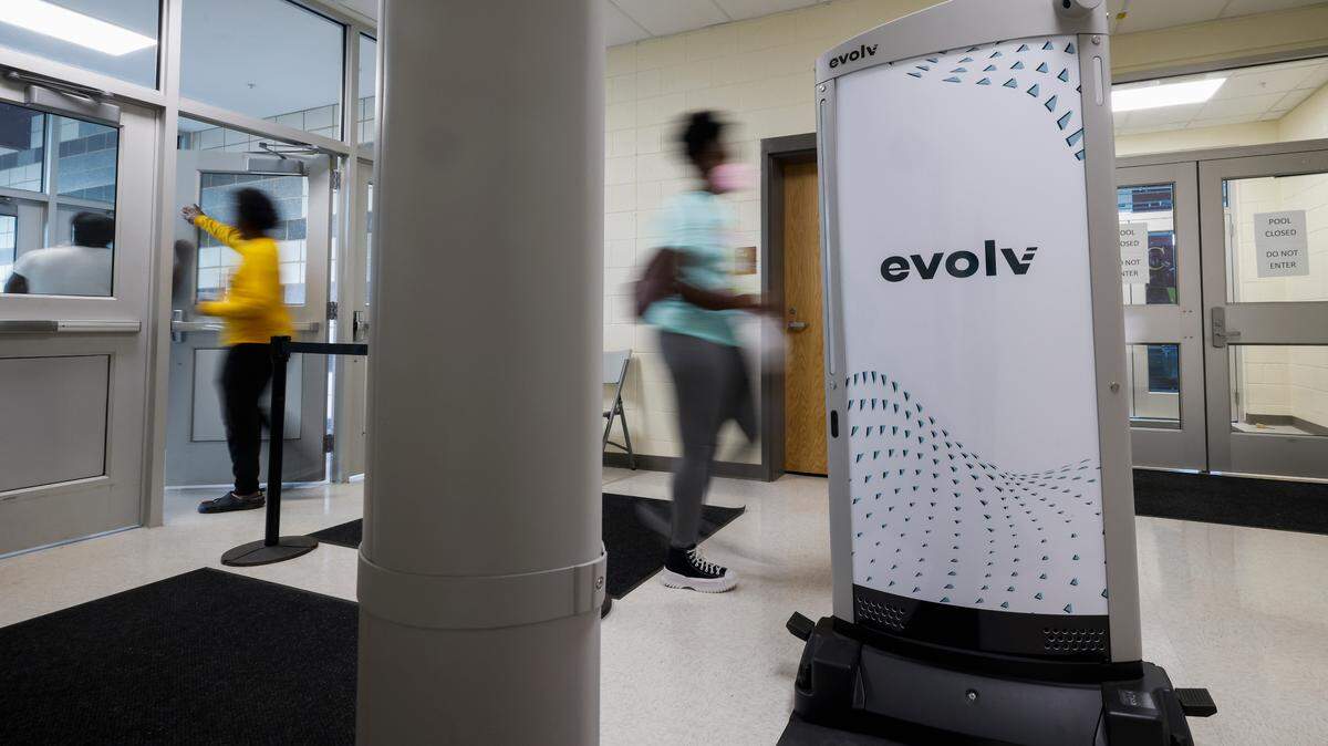 A student passes by a set of body scanners at West Charlotte High School in Charlotte in a 2022 file photo. 