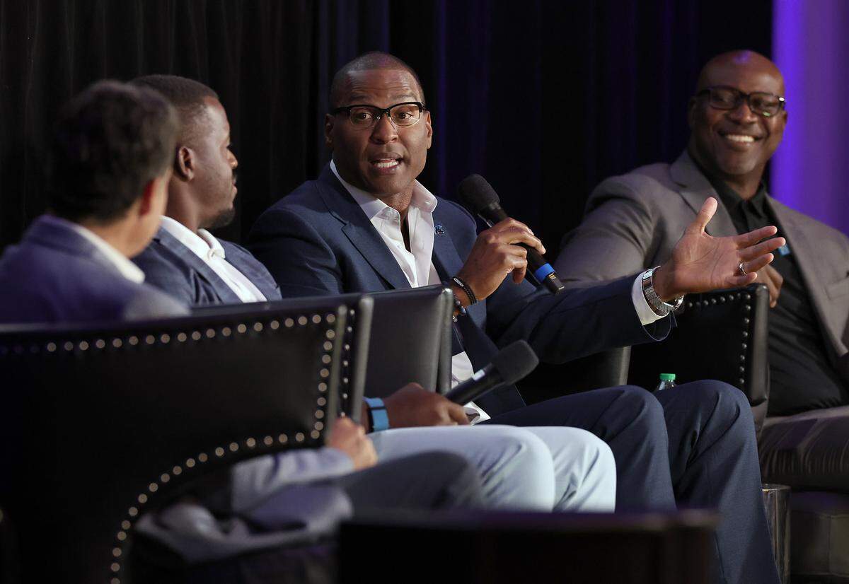 Former Carolina Panthers defensive Mike Rucker talks about his time with the team during the Charlotte Touchdown Club’s Carolina Panthers Kickoff Luncheon on Thursday, August 29, 2024. WBT Radio Sports Director Jim Szoke emceed a discussion with former running back Jonathan Stewart, Rucker and former defensive end Al Wallace.