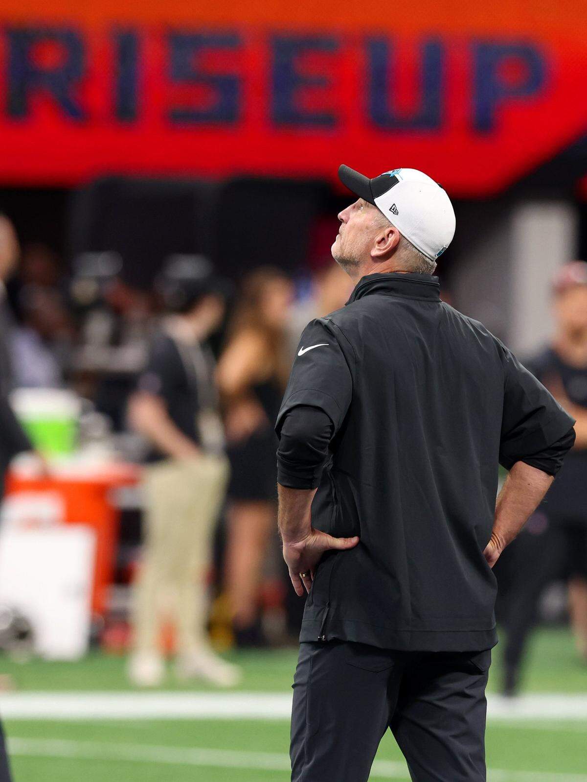 Carolina Panthers head coach Frank Reich looks into the rafters of Mercedes-Benz Stadium in Atlanta, GA on Sunday, September 10, 2023. The Panthers open the NFL season against the Atlanta Falcons.