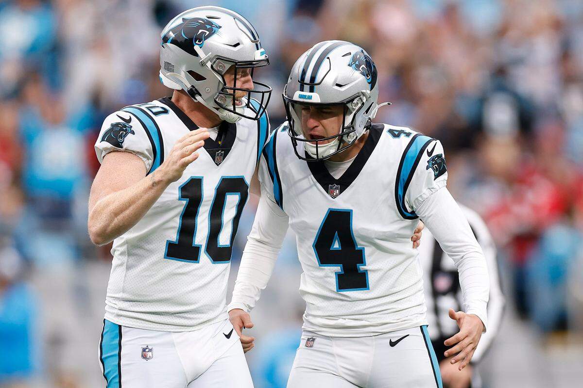 Carolina Panthers place kicker Eddy Pineiro (4) celebrates with Carolina Panthers punter Johnny Hekker (10) after kicking a field goal during a game against the Arizona Cardinals at Bank of America Stadium in Charlotte, N.C., Sunday, Oct. 2, 2022.