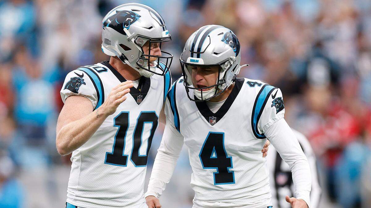 Carolina Panthers place kicker Eddy Pineiro (4) celebrates with Carolina Panthers punter Johnny Hekker (10) after kicking a field goal during a game against the Arizona Cardinals at Bank of America Stadium in Charlotte, N.C., Sunday, Oct. 2, 2022.