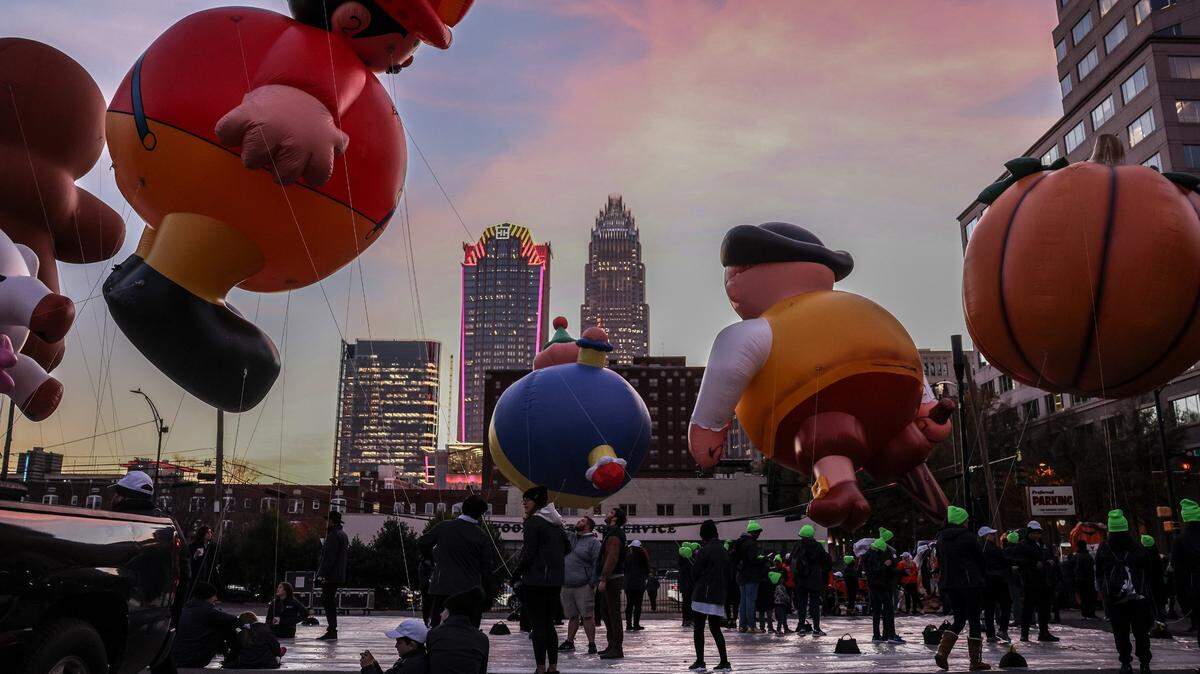 Balloons line up before the Novant Health Thanksgiving Day Parade in Charlotte, N.C., on Wednesday, November 24, 2021.