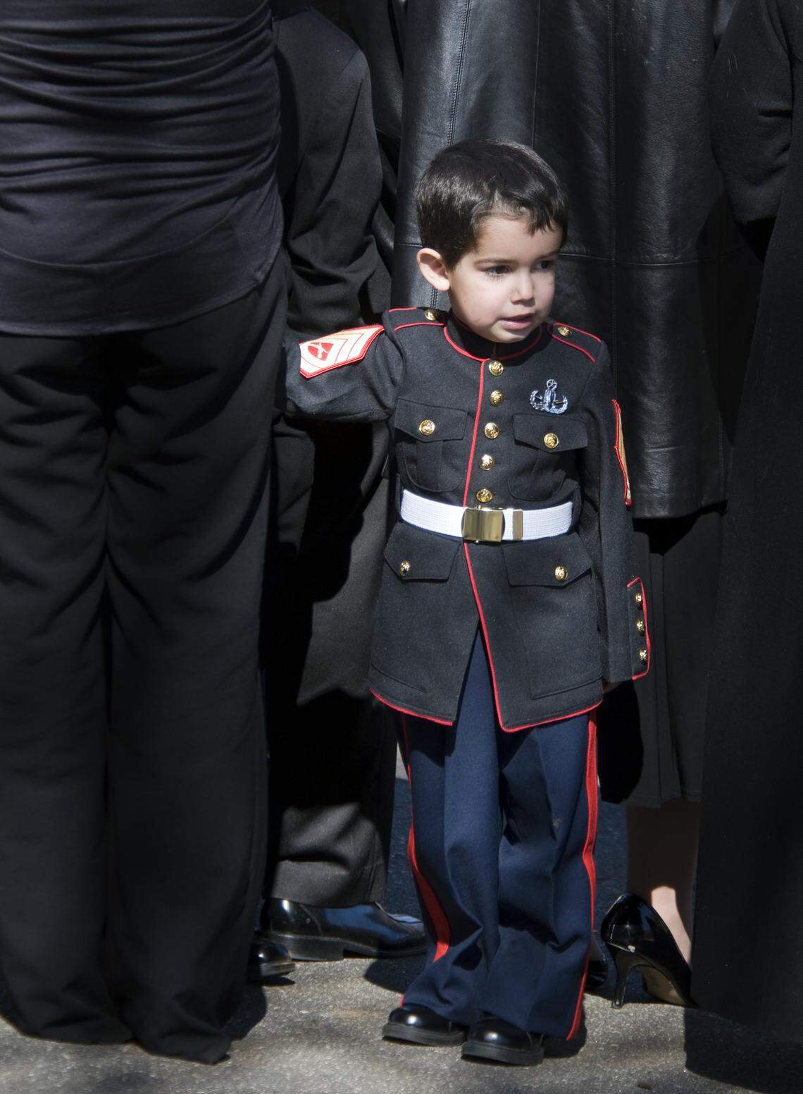 When Steven Eckard, wearing a Marine Corps dress uniform just like his father's at the funeral at Woodlawn Memorial Gardens, is old enough, his family wants him to understand what kind of man his father was. So they work to keep his memory alive.