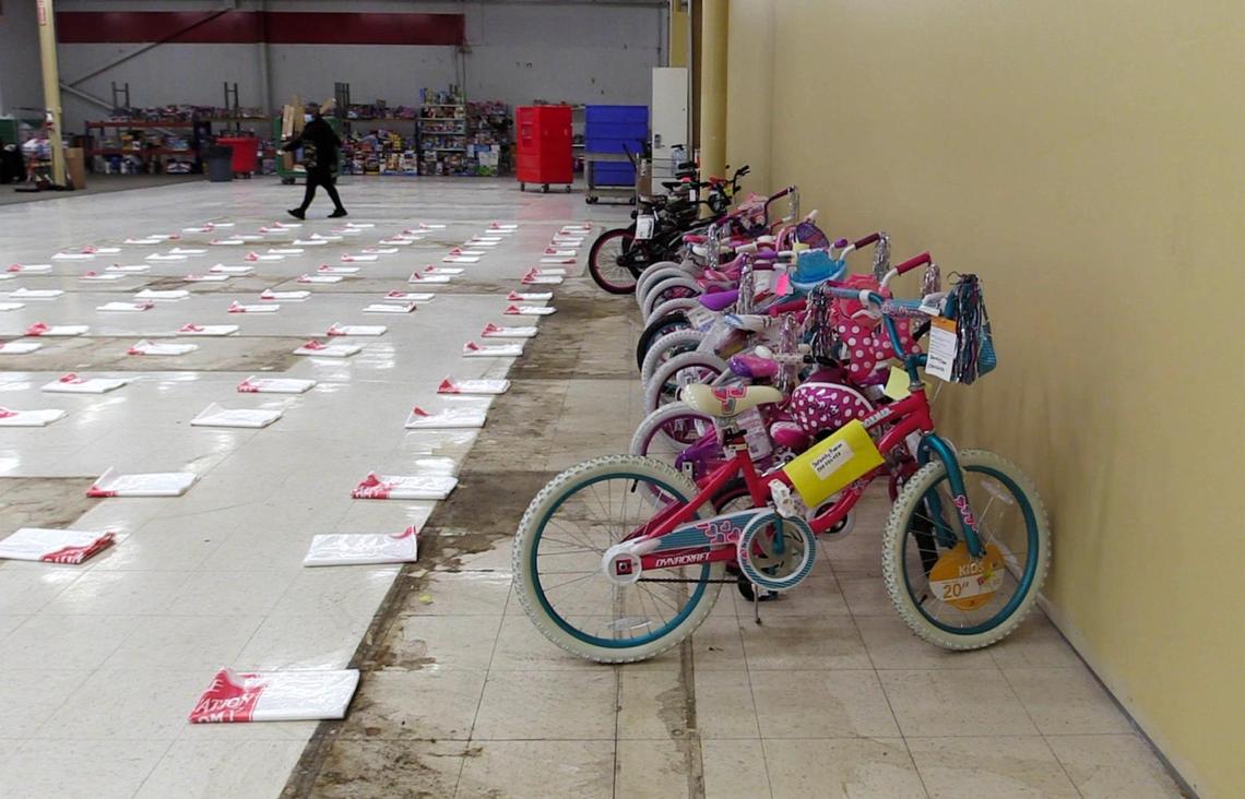 Bicycles and gift bags are arranged on the floor at The Salvation Army’s Christmas Center on Nov. 19, 2020, for its angel tree program, which matches children in need with anonymous donors who buy the gifts. The Charlotte Observer is holding its annual Empty Stocking Fund campaign to raise money for gifts in cases where there were no donations or gifts were not returned.