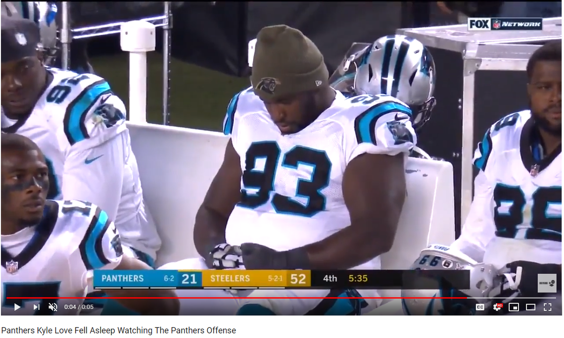 “Panthers Kyle Love fell asleep watching the Panthers Offense,” said Ultimate Sports Channel, when it posted this image on YouTube.