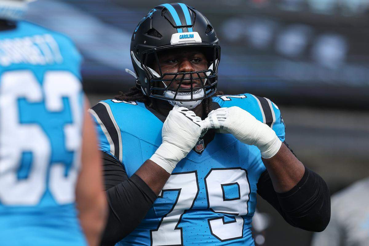 Panthers tackle Ickey Ekwonu warms up at Bank of America Stadium in Charlotte, North Carolina, on Oct. 26, 2025.