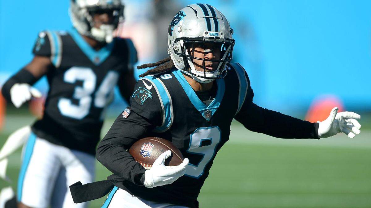 Carolina Panthers cornerback Stephon Gilmore rushes for yardage after intercepting a pass by New England Patriots quarterback Mac Jones during second quarter action at Bank of America Stadium in Charlotte, NC on Sunday, November 7, 2021.