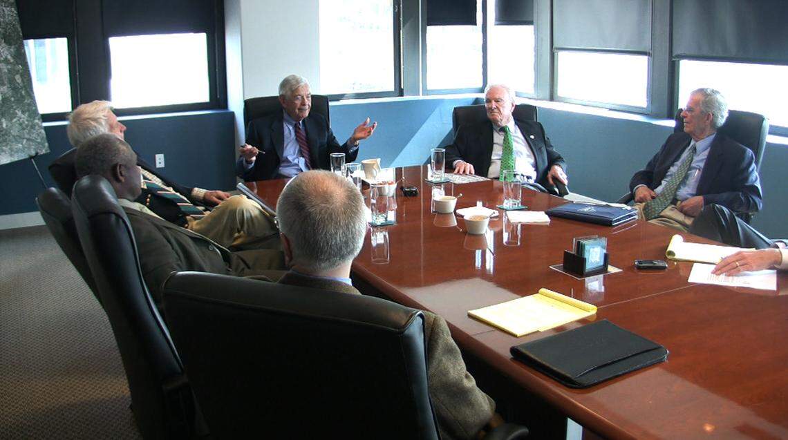 Five former center city leaders: former Charlotte mayor Harvey Gantt, second-left, former Charlotte Observer publisher Rolfe Neill, former Bank of America chairman and CEO Hugh McColl, center, former president of Ivey’s department store chain George Ivey, and former Charlotte city manager Wendell White, right, gathered at Charlotte Center City Partners to talk about the uptown organization’s accomplishments over the past 30 years on Tuesday, March 17, 2009.