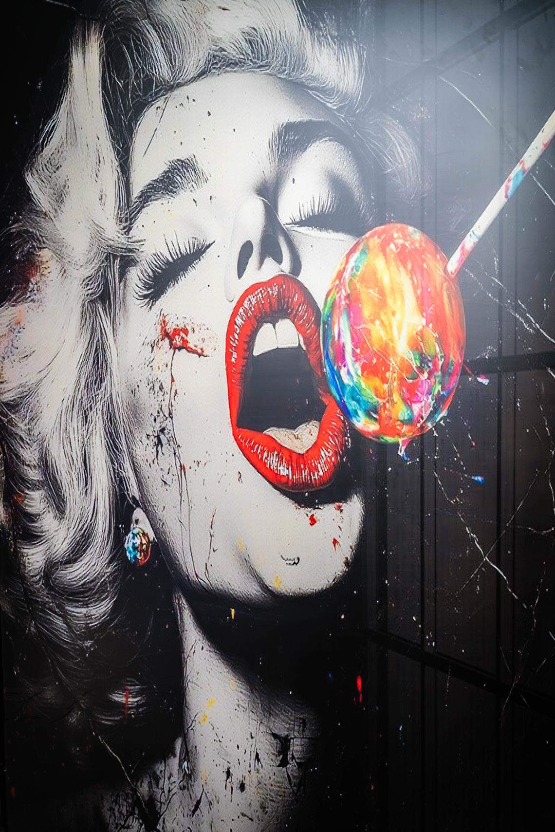 A stylized, black-and-white pop art painting of a person with bright red lipstick about to lick a colorful, dripping lollipop.