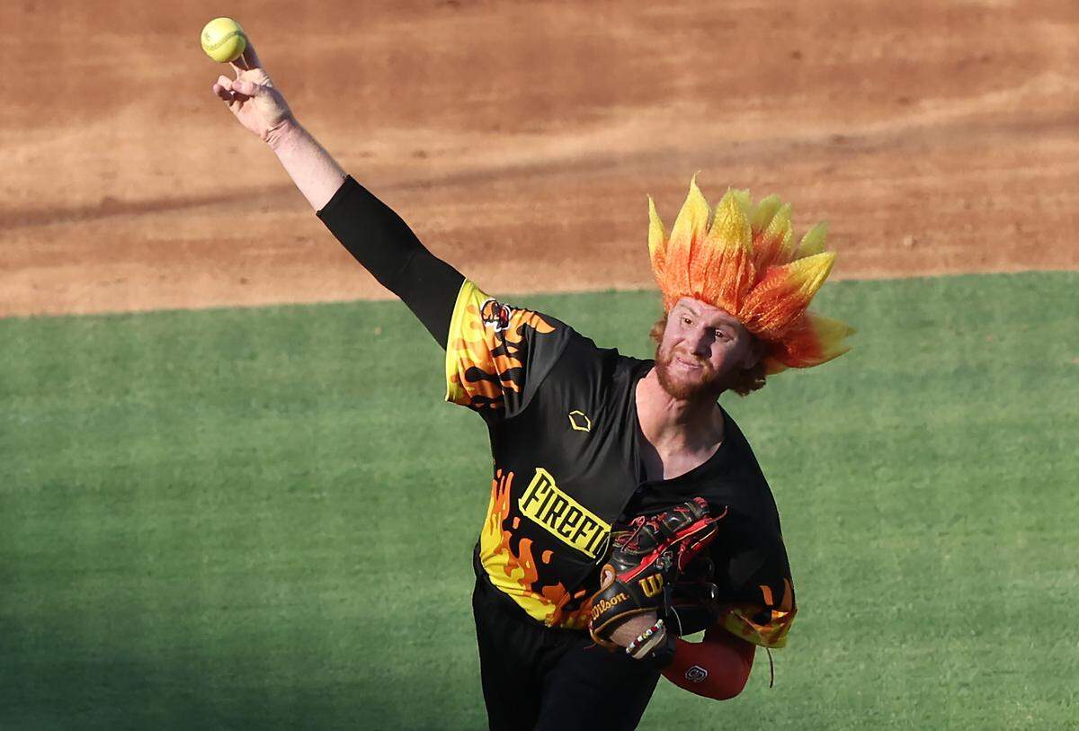 It wasn't the Heat Miser throwing pitches to the Texas Tailgaters at Truist Field on Thursday, June 4, 2026 but Firefighters pitcher Austin Temple . Banana Ball action returned to the Queen City with the Texas Tailgaters battling the Firefighters.
