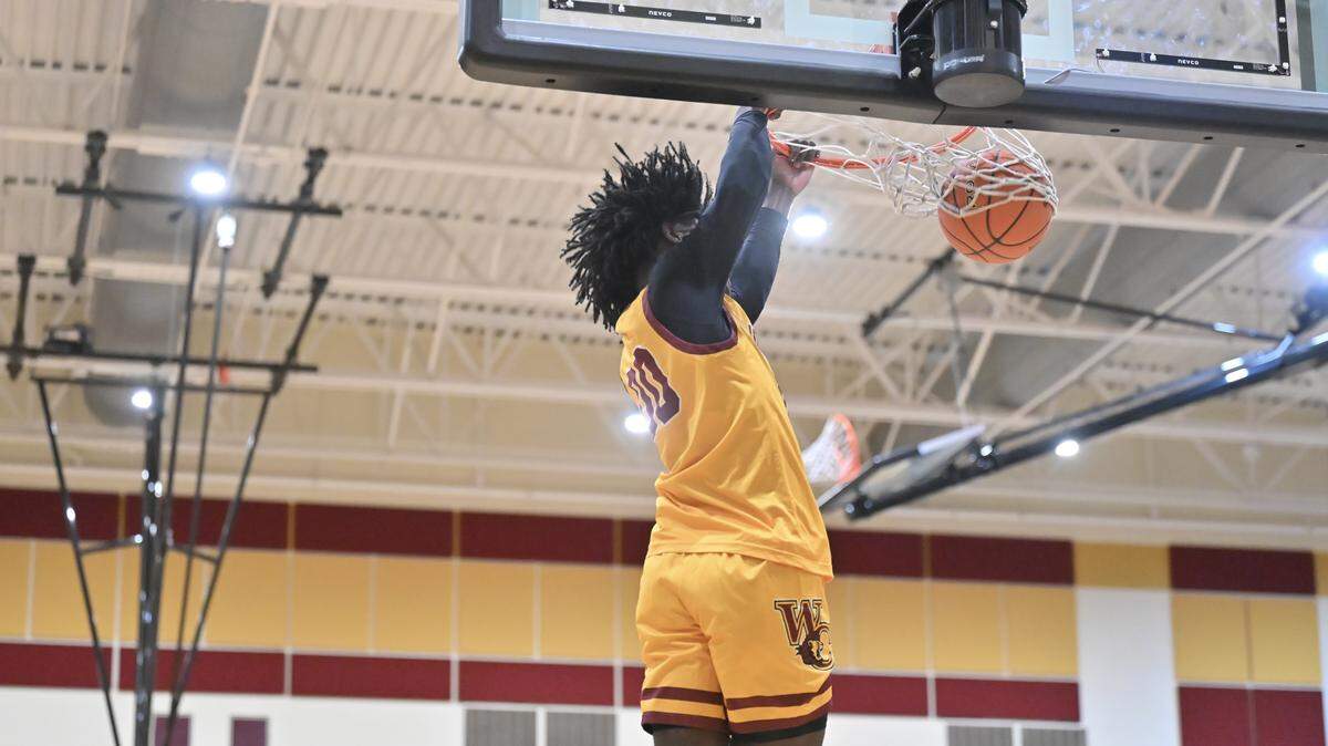 West Charlotte’s Kaharri Coleman dunks during Friday’s game with Harding at the Charlotte Hoops Challenge at Harding High School in Charlotte, North Carolina, on Friday, Nov. 28, 2025