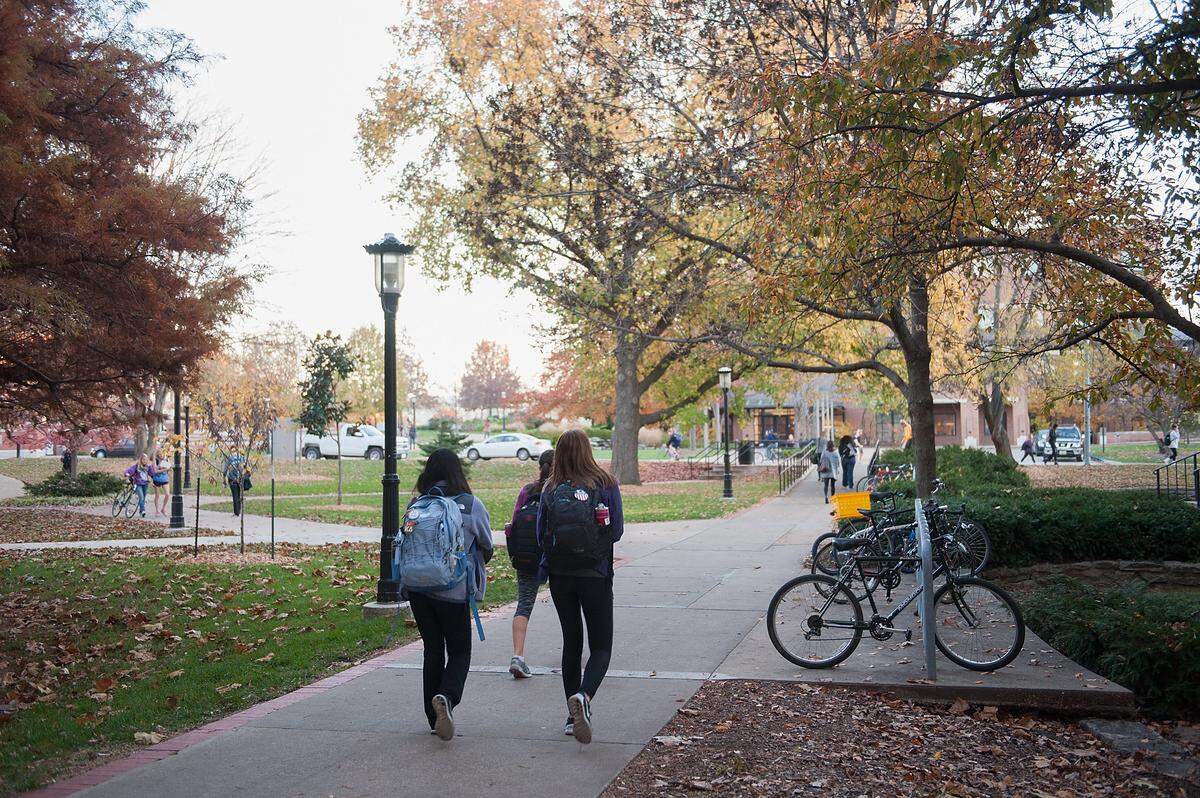 COLUMBIA, MO - NOVEMBER 10: Students walk along on the campus of University of Missouri - Columbia on November 10, 2015 in Columbia, Missouri. The university looks to get things back to normal after the recent protests on campus that lead to the resignation of the school's President and Chancellor on November 9. (Photo by Michael B. Thomas/Getty Images)