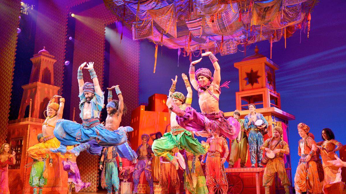 Bob Crowley’s eye-popping sets will be on full view in Charlotte Sept. 10-29 when Disney Theatrical Productions’ “Aladdin” comes to Belk Theater. Here, male dancers in the touring company perform to “Arabian Nights.”