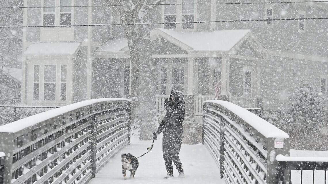 Charlotte snow total may hit 13 inches. Roads are a mess; many CLT flights canceled