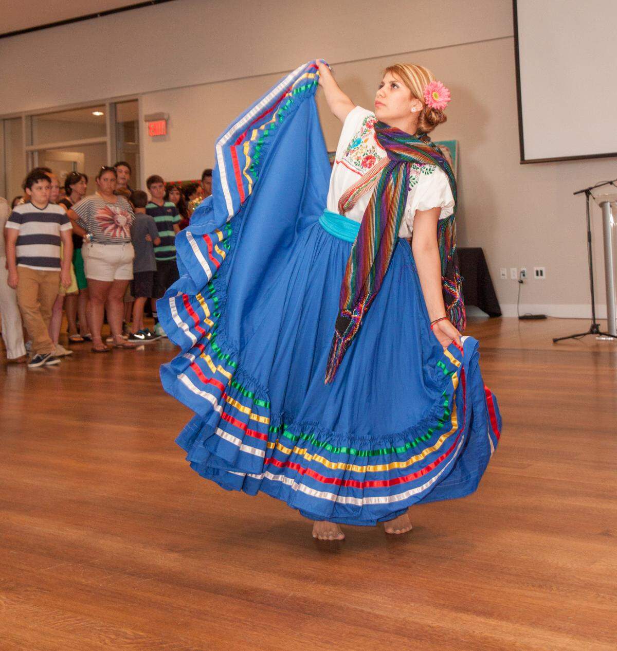 Alma Campuzano of El Alma de la Luna Dance Academy performs at the Mint Museum during a Con A de Arte (“A is for Art”) event. The annual Con A de Arte event highlights the work of Latino artists in the Charlotte area.