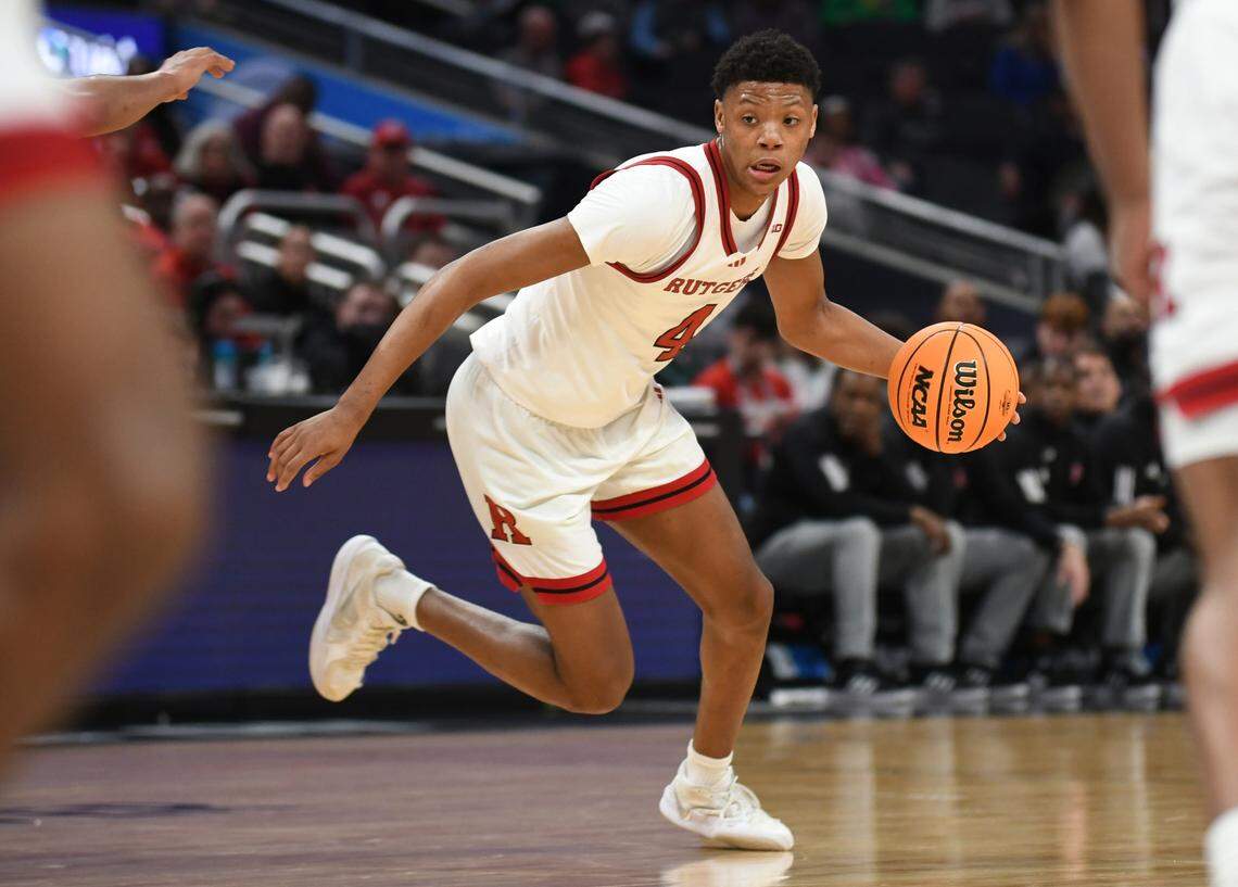 Mar 12, 2025; Indianapolis, IN, USA; Rutgers Scarlet Knights guard Ace Bailey (4) goes to the basket during the first half against the USC Trojans at Gainbridge Fieldhouse. Mandatory Credit: Robert Goddin-Imagn Images